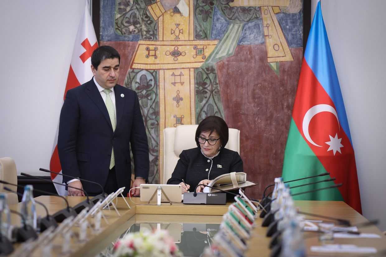 Azerbaijan’s Parliamentary Speaker Sahiba Gafarova signs the memorandum of cooperation as her Georgian counterpart looks on. Official image.