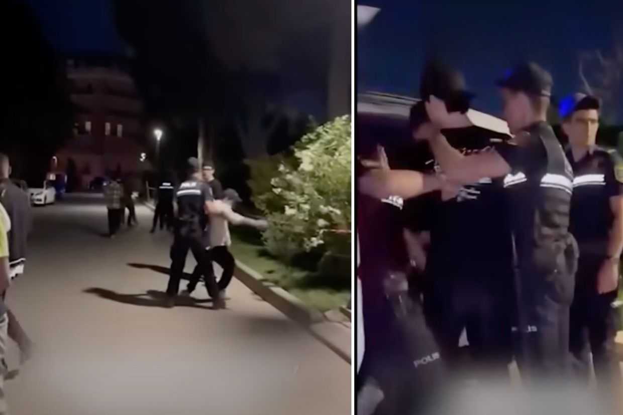 The teenagers were forcibly taken to a police car. Screengrabs from the video.