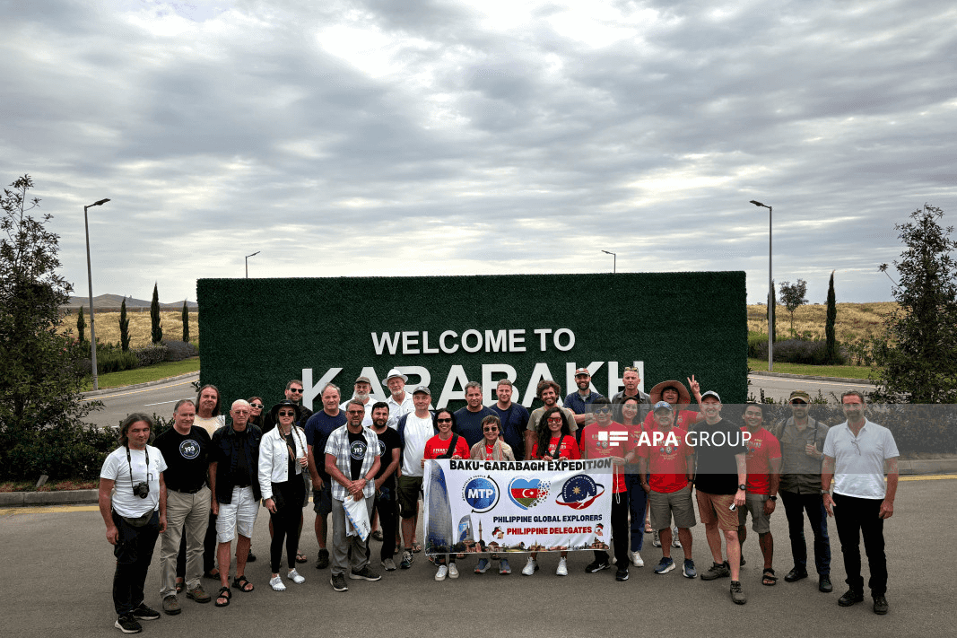 A group of foreign visitors in Nagorno-Karabakh documented by the Azerbaijani pro-government media outlet APA.