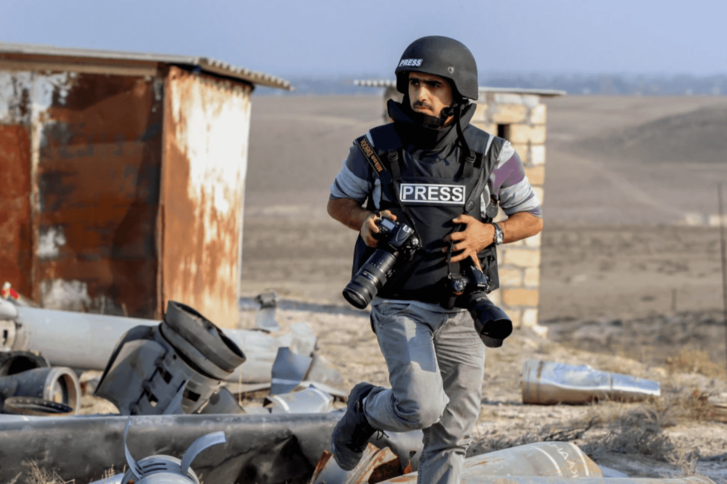 Ahmad Mukhtar reporting near the front. Photo: Famil Mahmudbayli.