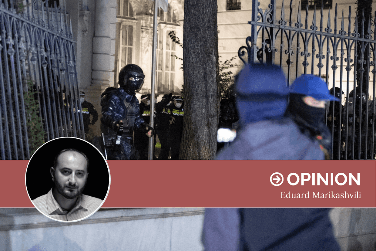 Riot police guard the presidential palace in Tbilisi after protesters brought part of the fence down. Photo: Mariam Nikuradze/OC Media.