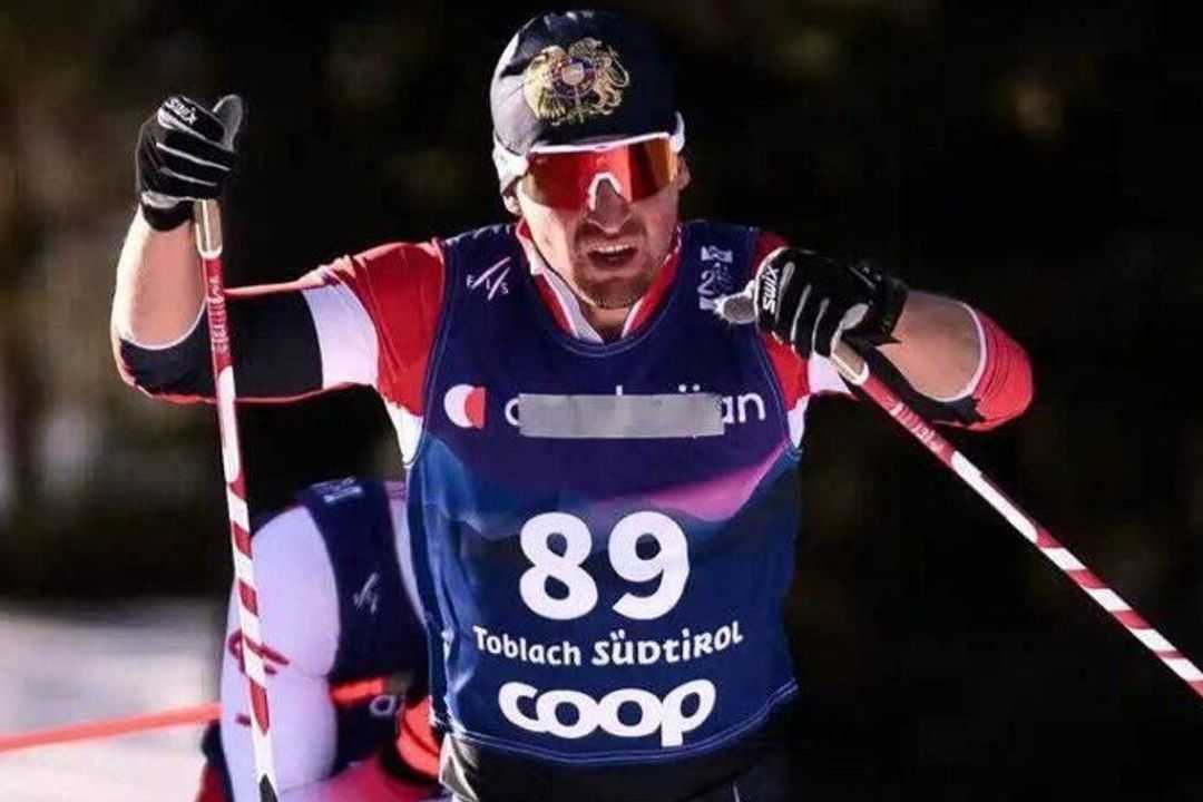 Armenian skier Mikael Mikaelyan as seen after covering the word Azerbaijan on his suit. Photo via REF/RL.