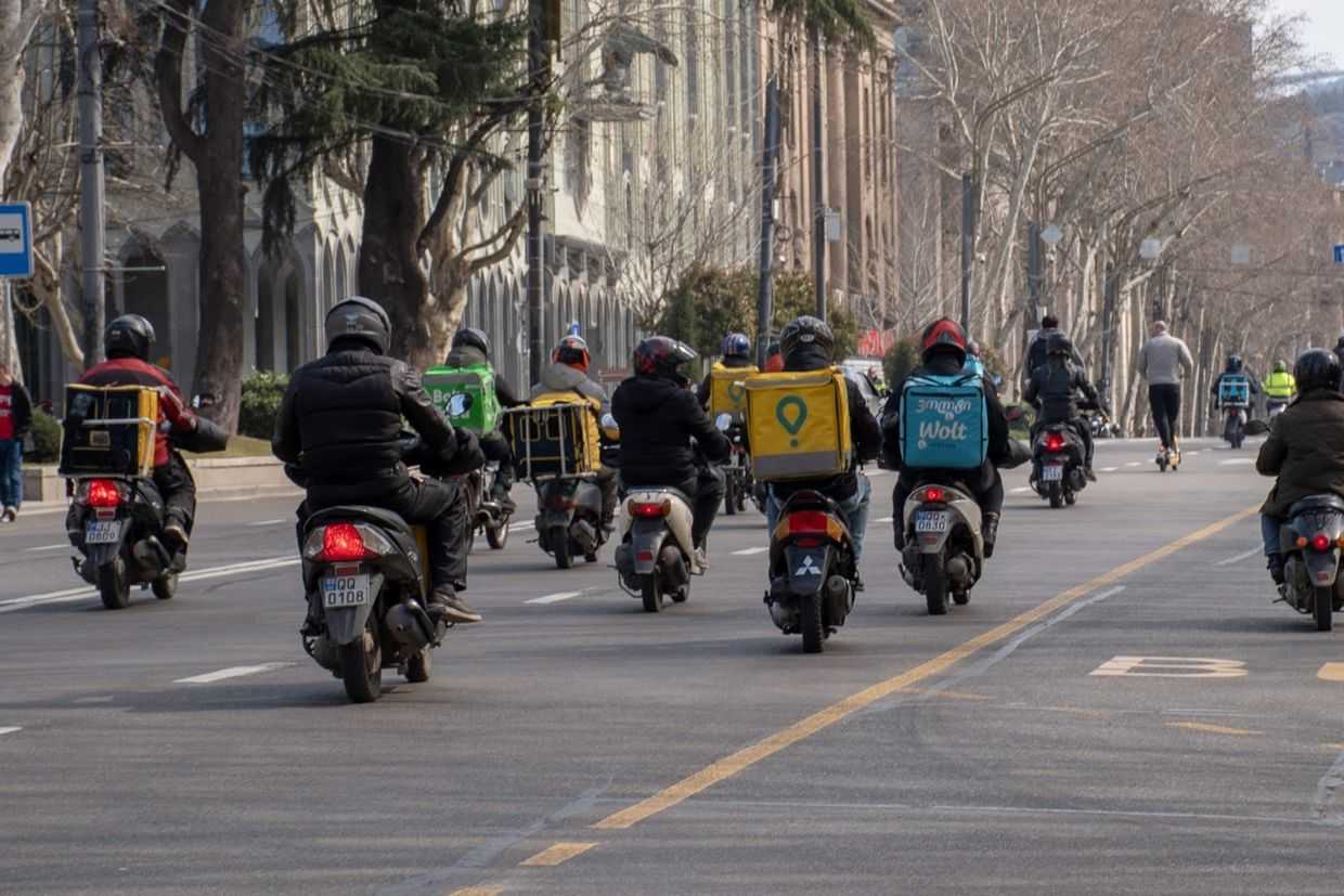Couriers in central Tbilisi. Photo: Mariam Nikuradze/OC Media.