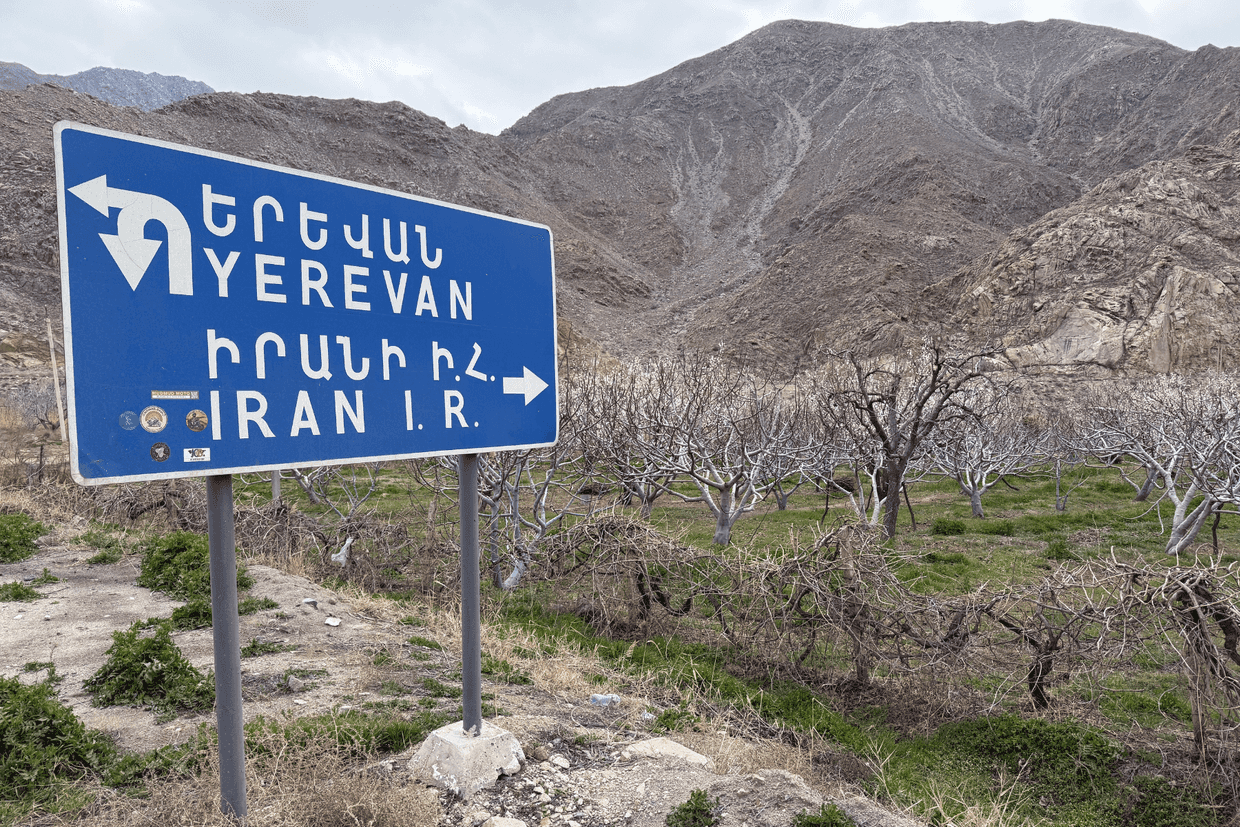 A road sign pointing to Armenia's capital of Yerevan in one direction and to Iran the other. Photo: Marut Vanyan/OC Media.