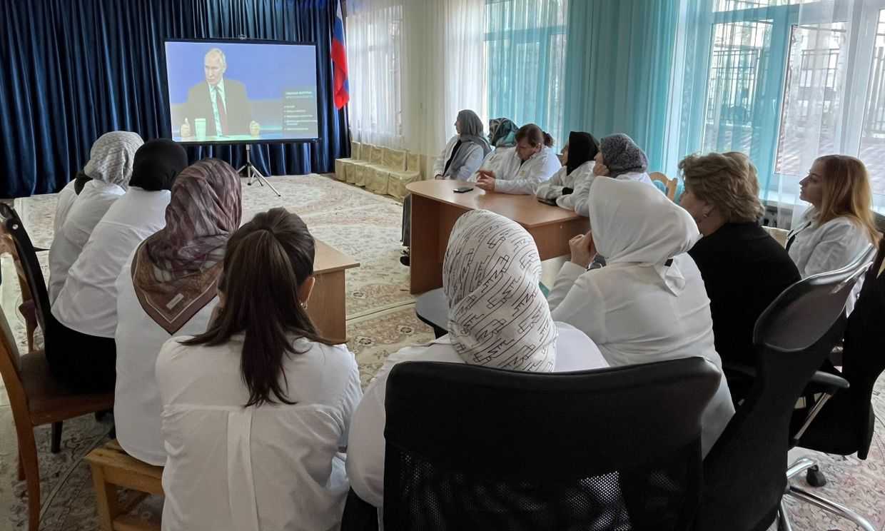 School staff watching Russian President Vladimir Putin's annual marathon call-in at a school in Buynaksk, Daghestan. Photo from social media.