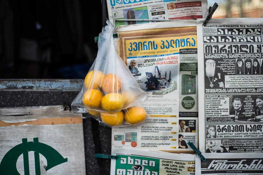 Small kiosks also sell lemons along with other goods. ‘These ones have been hanging here for two weeks’, the owner said. (Tamuna Chkareuli / OC Media)