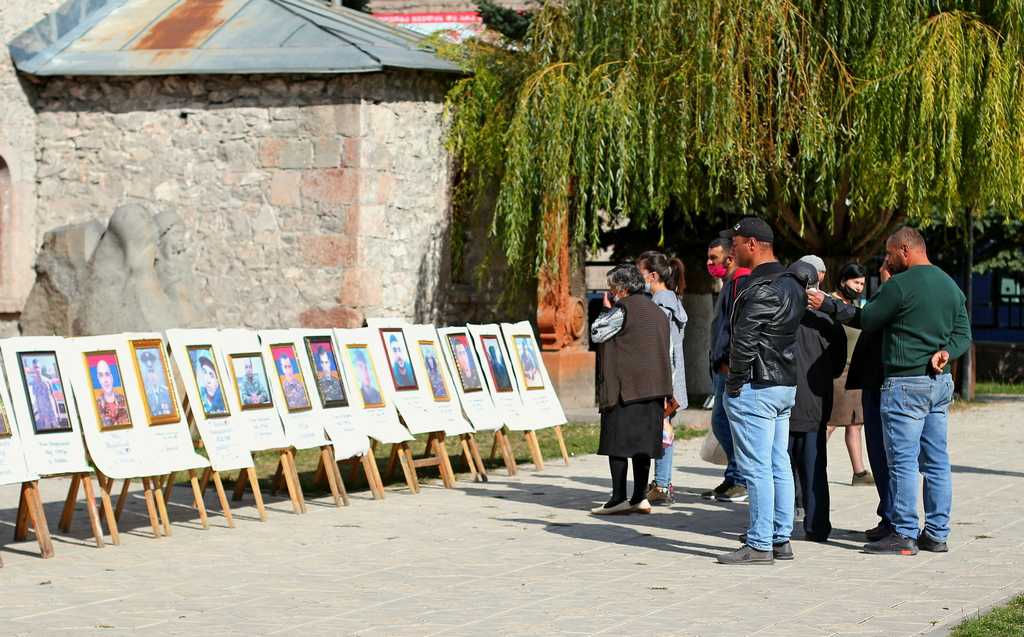 Portraits of soldiers killed in the war in Nagorno-Karabakh in a churchyard in Akhalkalaki. Photo: Amaliya Babayan/OC Media.
