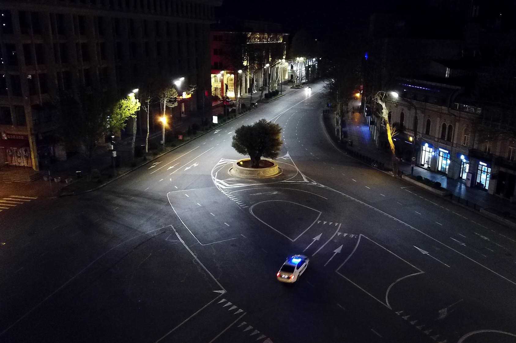 A police car during the curfew in Tbilisi. Photo: Mariam Nikuradze/OC Media.