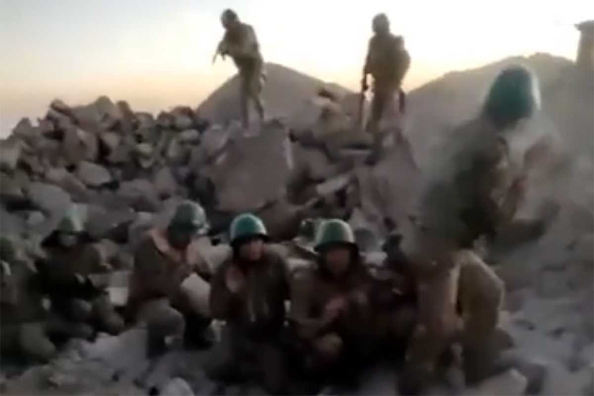 A still from the video moments before the prisoners are executed.