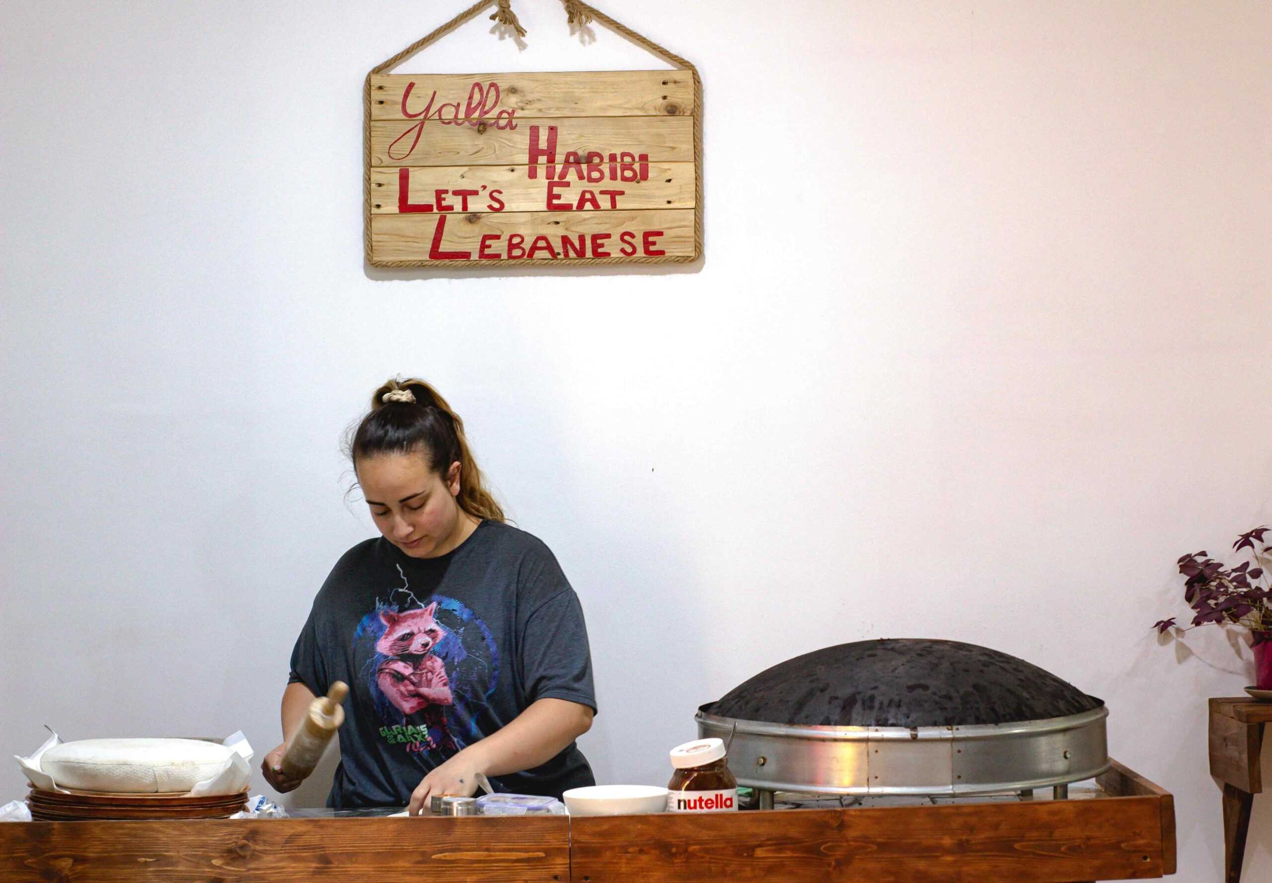 Kiki cooking at Sajj Terouh Setté. Photo: Hranush Mashakaryan/OC Media