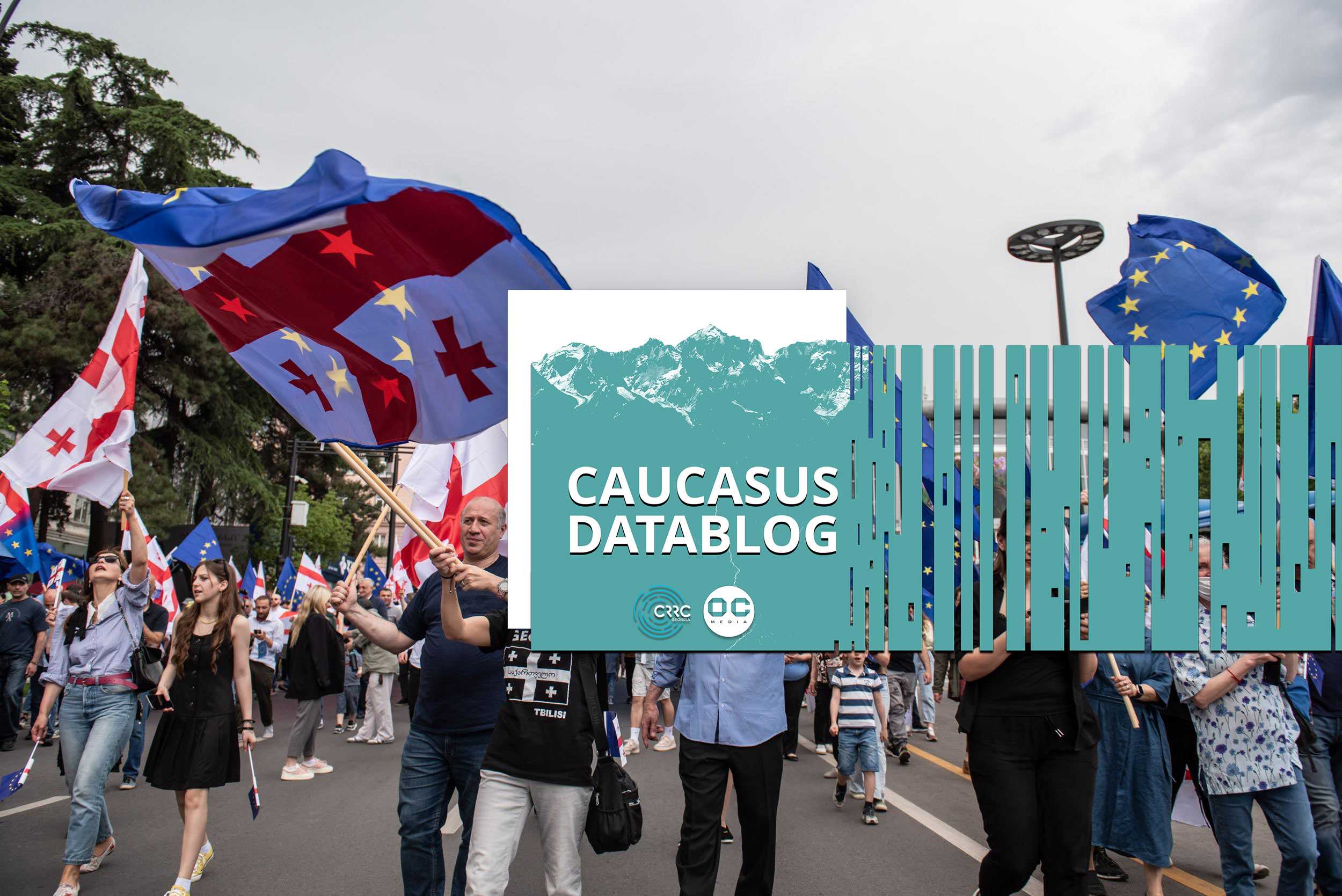 People carrying EU and Georgian flags at a pro-EU demonstration on Georgia's Independence Day, 26 May 2023. Photo: Mariam Nikuradze/OC Media