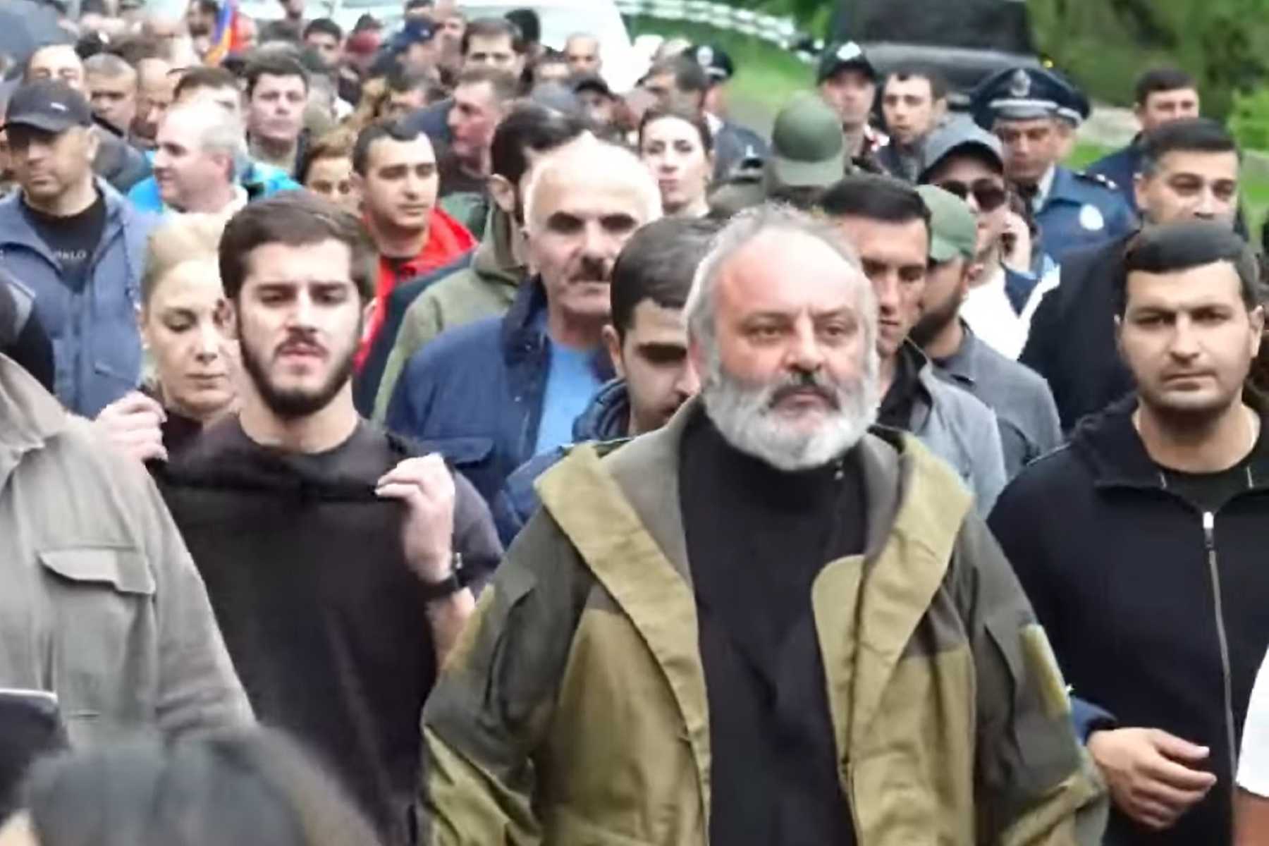 Archbishop Srbazan leading the march. Screengrab via News.am