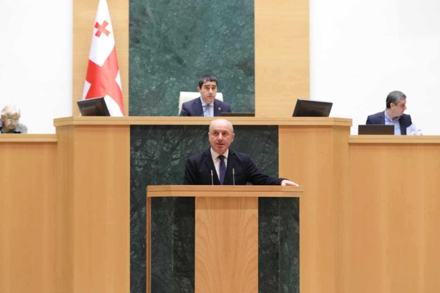 Guram Macharashvili addressing the parliament on 12 December. Image: Parliament of Georgia