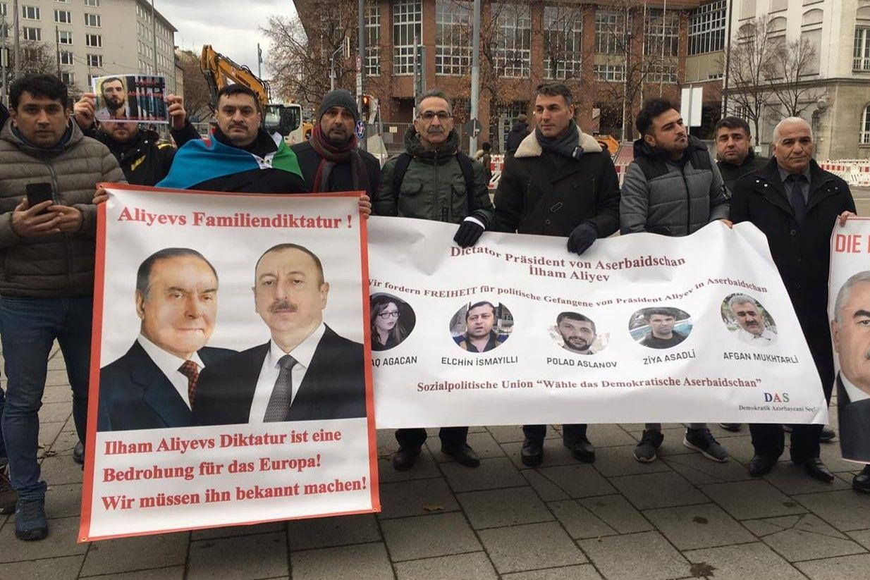 Samir Ashurov (first from left) demonstrates against Azerbaijani President Ilham Aliyev in Munich in 2019. Also in the photo is Mutallim Orujov (fifth from left). Photo via social media.