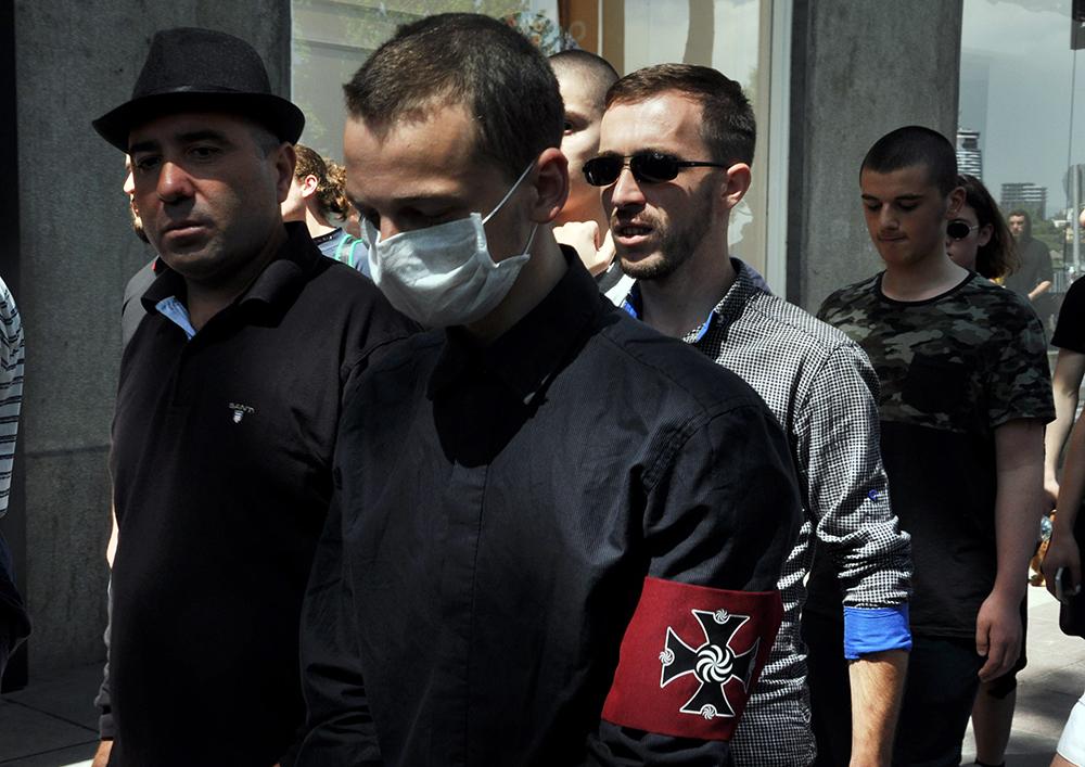 Members of the Nationalist Socialist Movement — National Unity of Georgia frequently wear armbands in public (Mari Nikuradze/OC Media)