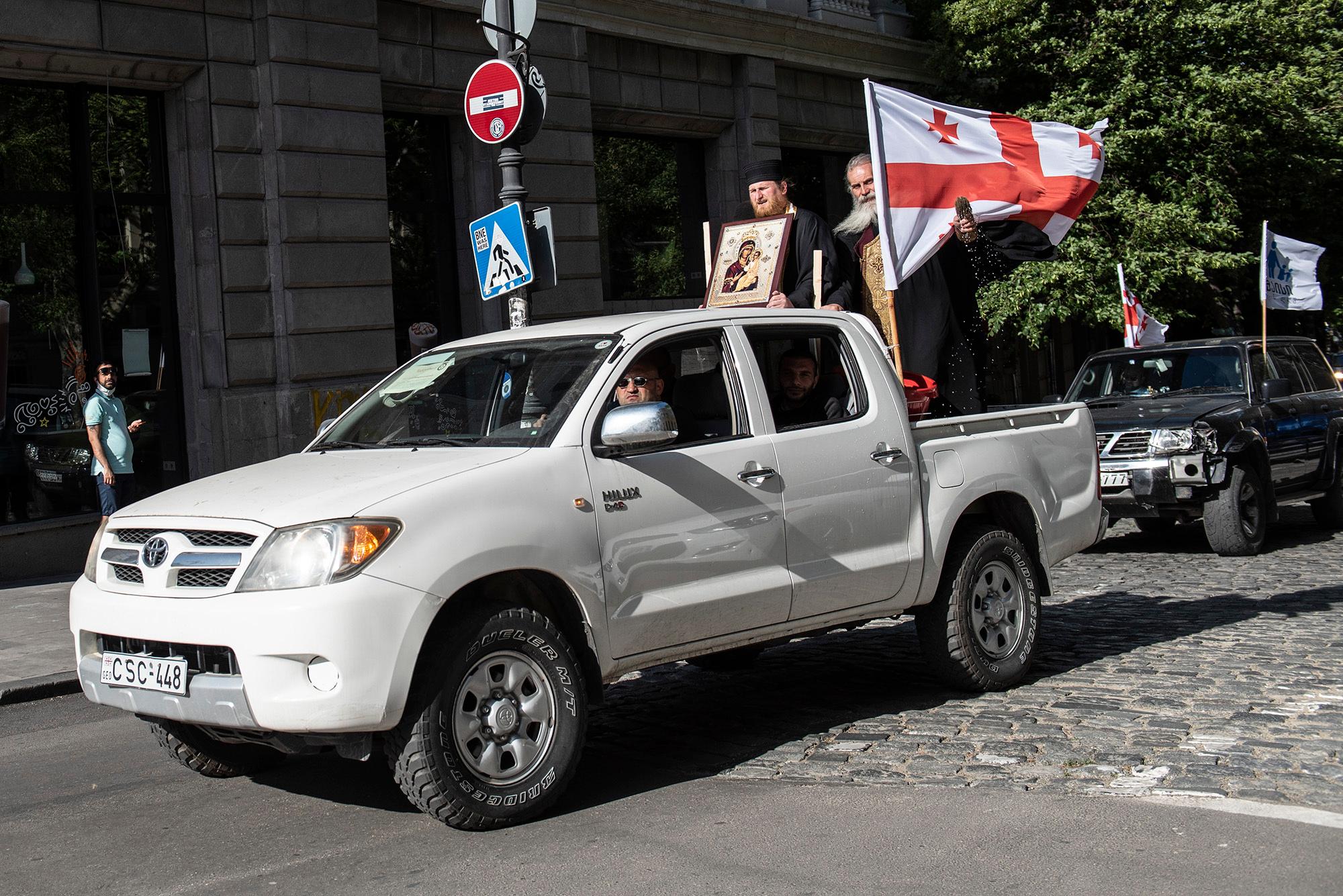 A 'blessmobile' rides through Tbilisi streets on 17 May. Photo: Mariam Nikuradze/OC Media.