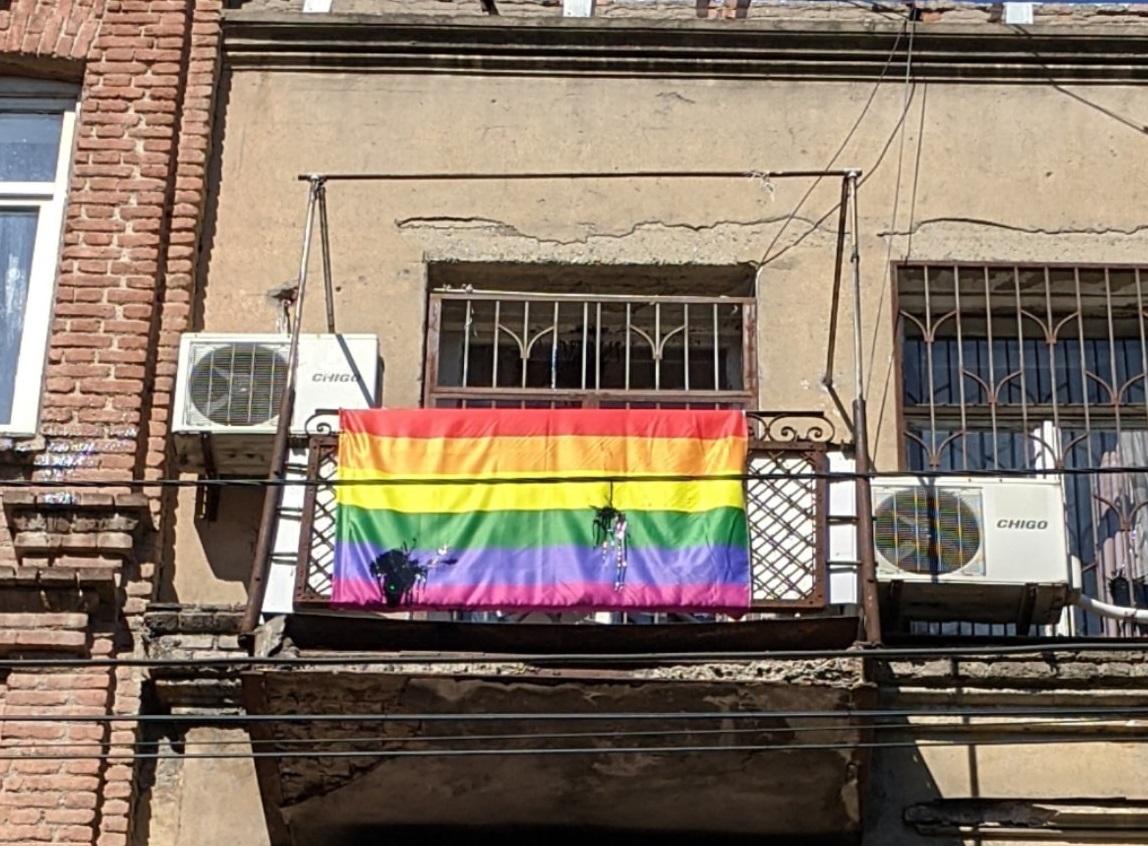 Black paint thrown on a rainbow flag hanging from the Tbilisi Pride office. Photo: Zneoba Daitsavi.