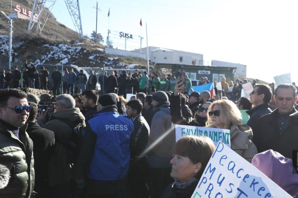 Protesters by the entrance to the Lachin corridor. Photo: Report.az