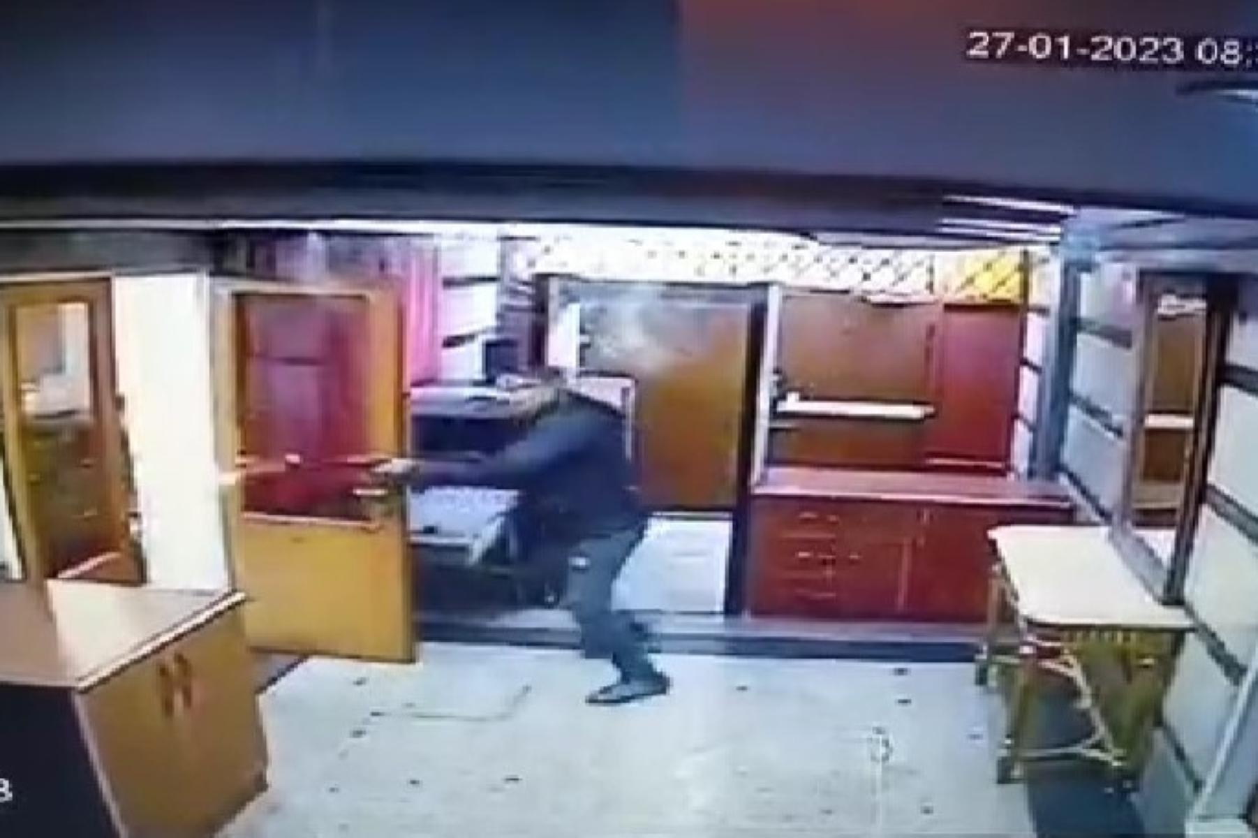 Security camera footage purportedly showing the attacker inside the embassy. Screenshot from video from Report.az