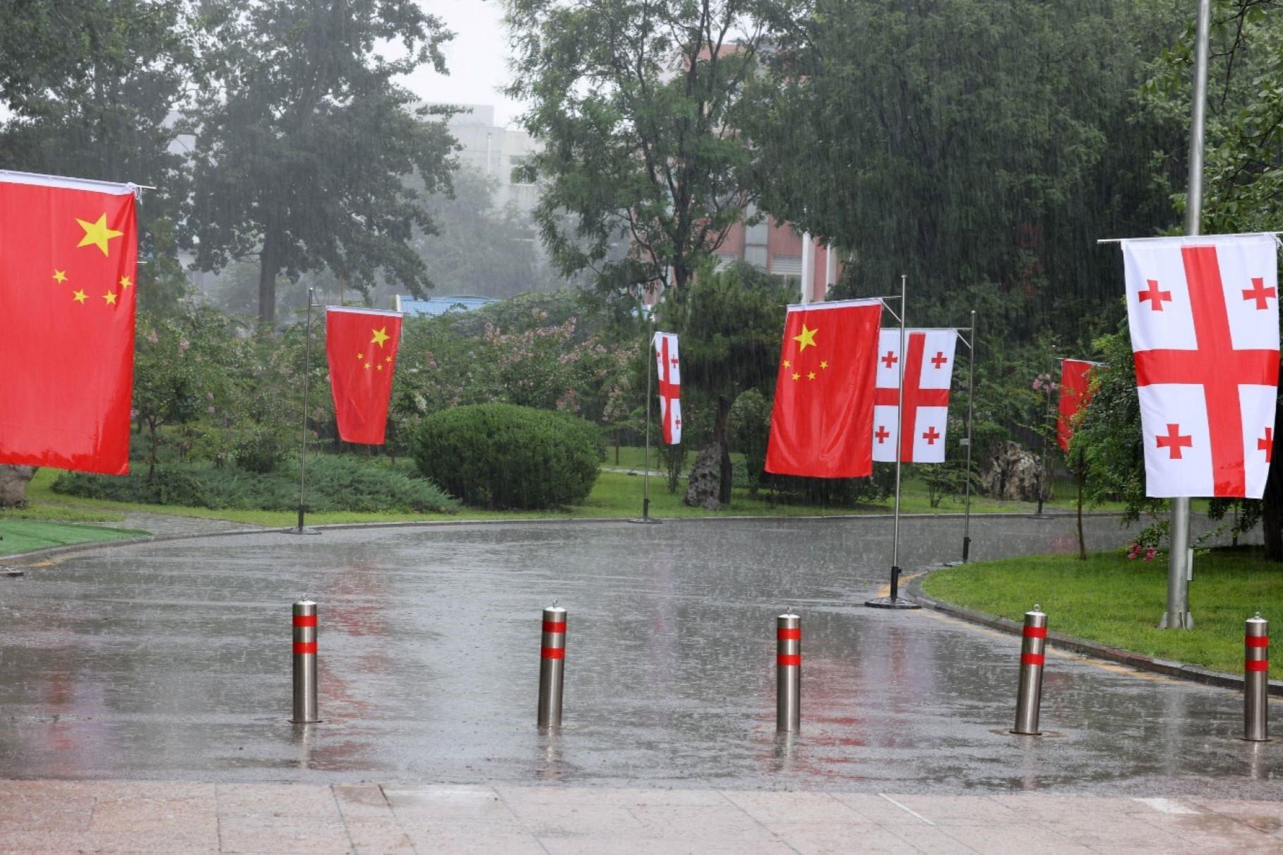 Georgian and Chinese flags in Beijing. Image via the Government of Georgia.