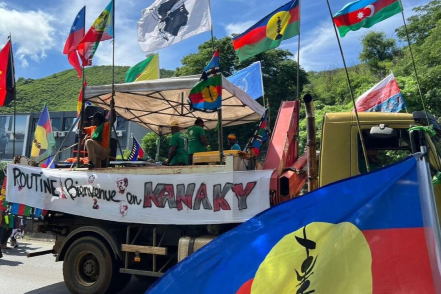 An Azerbaijani flag flying at a demonstration in New Caledonia in March. Screengrab via Franceinfo