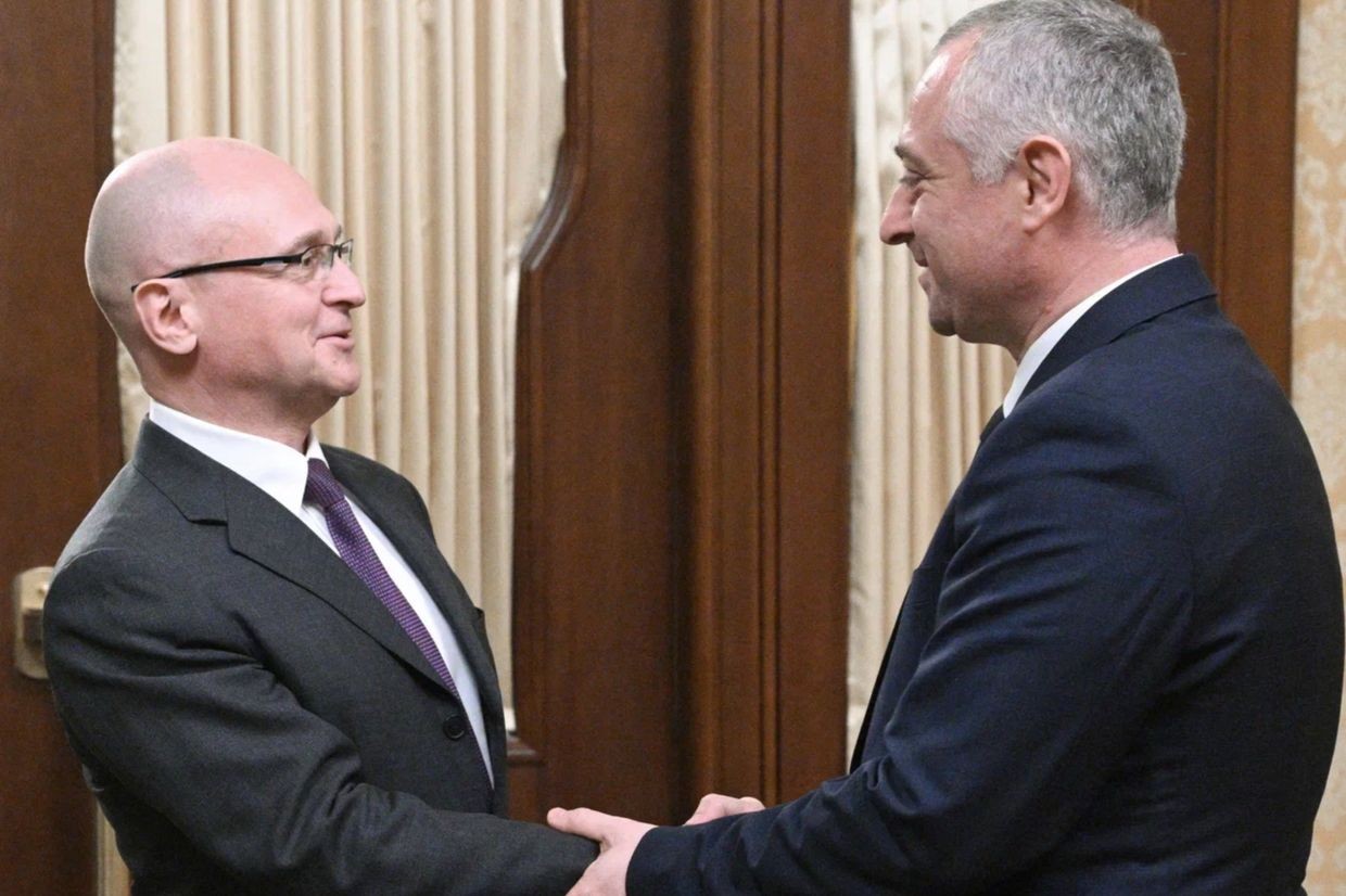 Presidential candidate Badra Gunba (right) shakes hands with Sergei Kiriyenko, the deputy head of Russia’s presidential administration. Photo via Obzor.io.