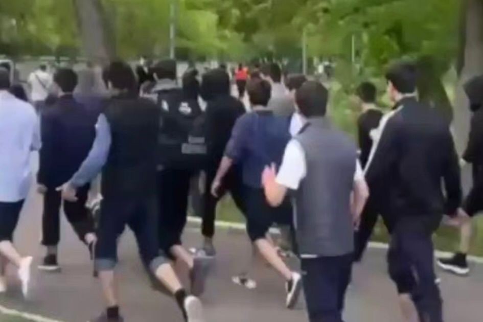 Daghestani youth purportedly running to join street brawls. Screengrab from video/Caucasian Knot.