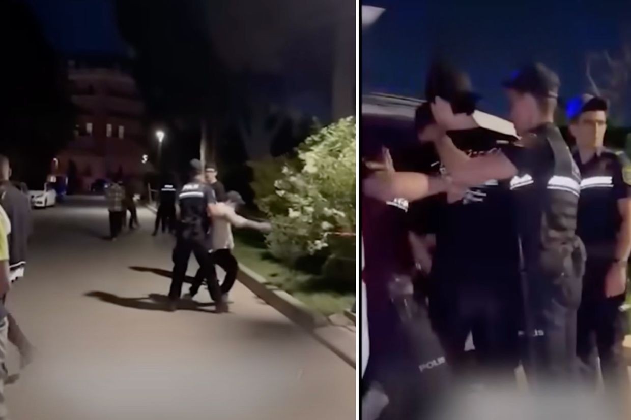 The teenagers were forcibly taken to a police car. Screengrabs from the video.