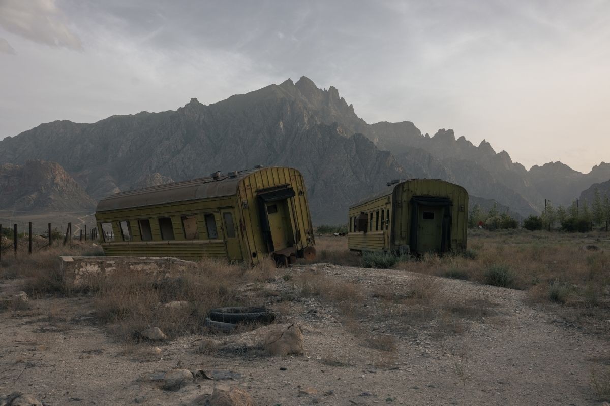 Rusting railway cars sit abandoned near Agarak near the border with Iran, remnants of the past Meghri railway line that once connected southern Armenia to Azerbaijan and Iran. For illustrative purposes. Photo: Anthony Pizzoferrato/OC Media.
