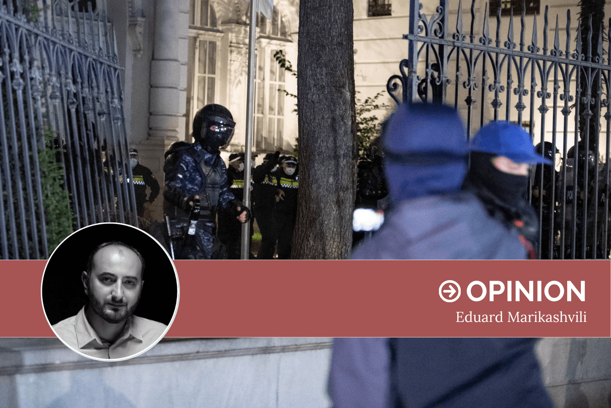 Riot police guard the presidential palace in Tbilisi after protesters brought part of the fence down. Photo: Mariam Nikuradze/OC Media.