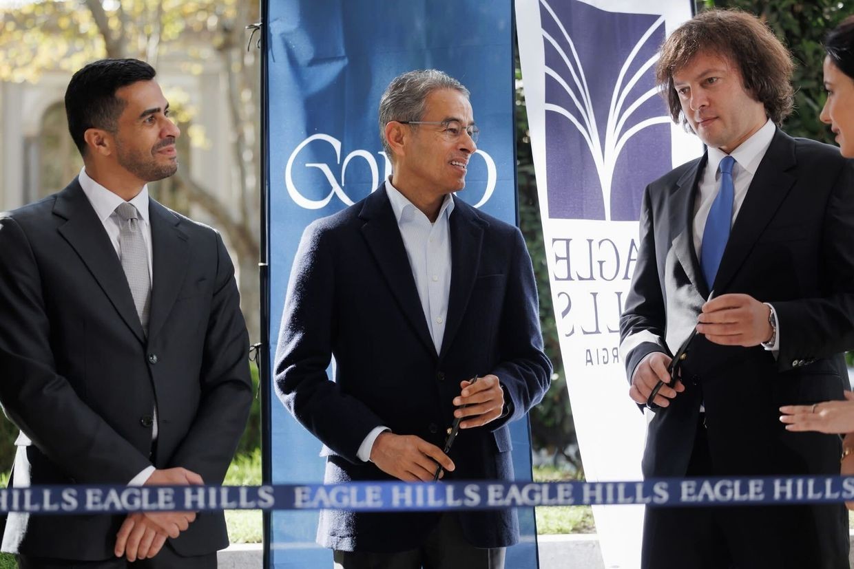 Georgian Prime Minister Irakli Kobakhidze (far right) at the opening ceremony of the Eagle Hills showroom on Rustaveli Avenue. Photo via social media.