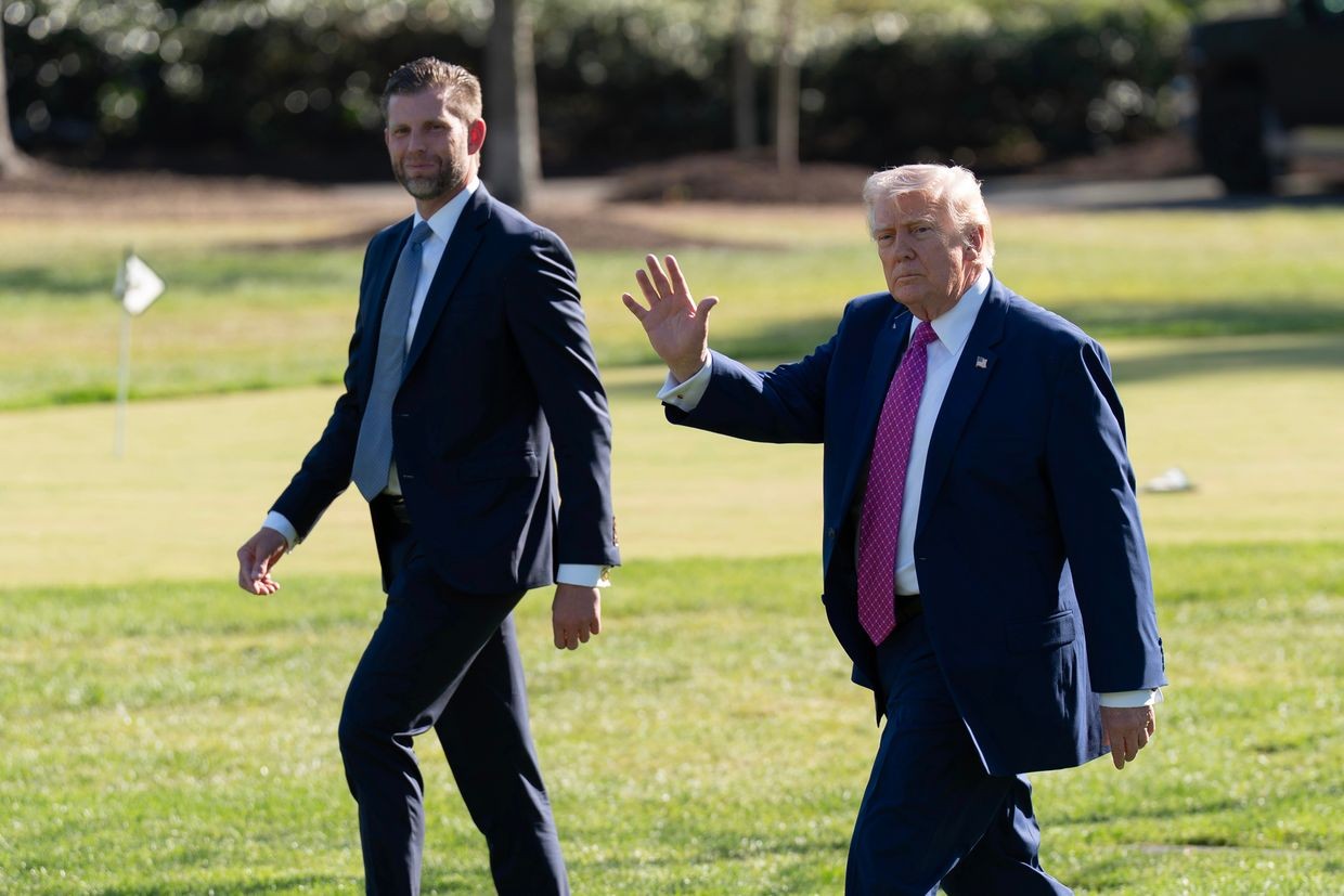 President Donald Trump walks with Eric Trump as they prepare to depart on Marine One from the South Lawn of the White House on 10 April 2026, in Washington. (AP Photo/Jose Luis Magana).