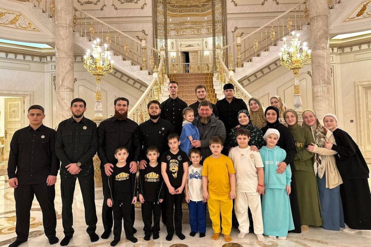 Ramzan Kadyrov (centre) surrounded by members of his immediate family. Official image.&nbsp;