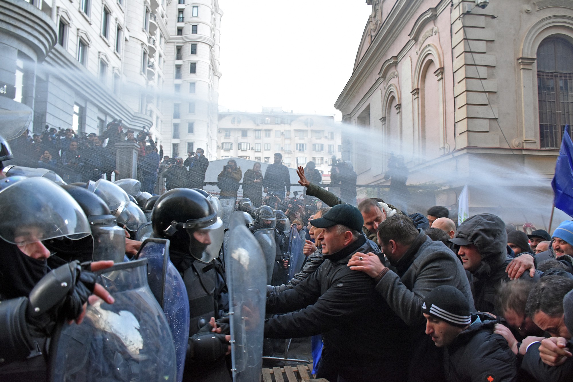 Riot police use water canon to disperse demonstrators during a protest against the government. Photo: Mari Nikuradze/OC Media