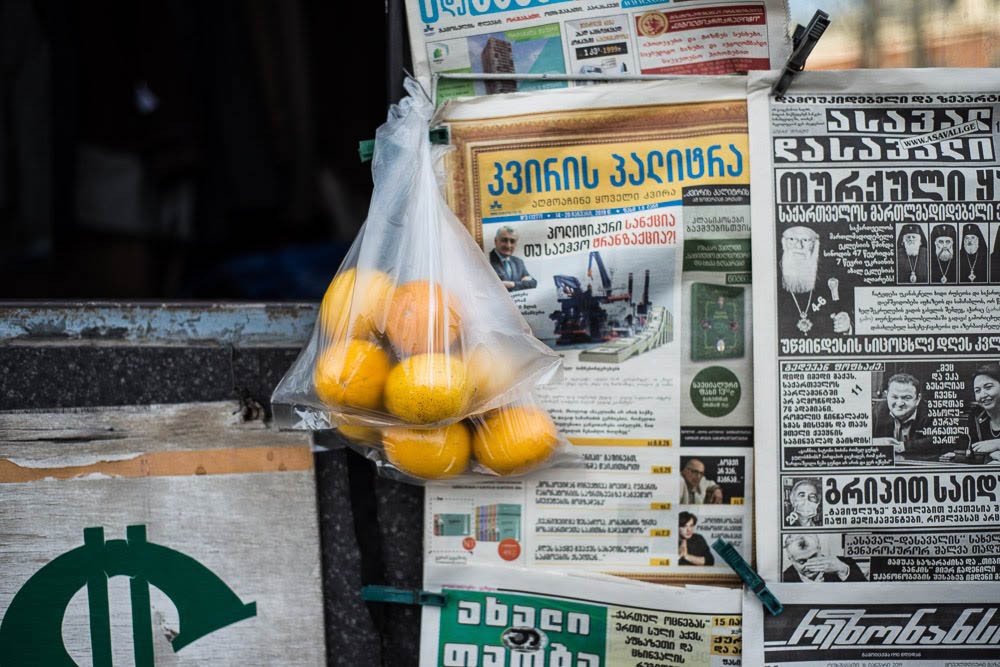 Small kiosks also sell lemons along with other goods. ‘These ones have been hanging here for two weeks’, the owner said. (Tamuna Chkareuli / OC Media)