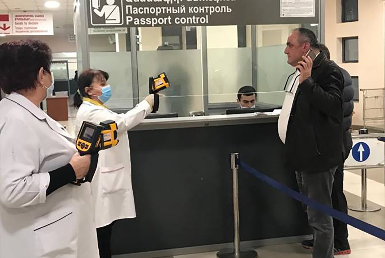 Screening for  the coronavirus at a border crossing in Armenia. Photo: ArmenPress.
