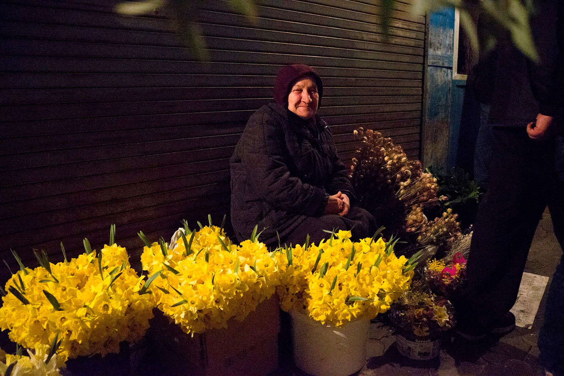 Lena picks flowers in the mountains. Photo: Girogi Rodionov/OC Media.