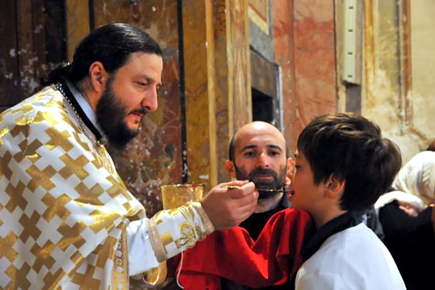 The rite of Holy Communion at an Orthodox Church in Georgia. Photo: Karibche.