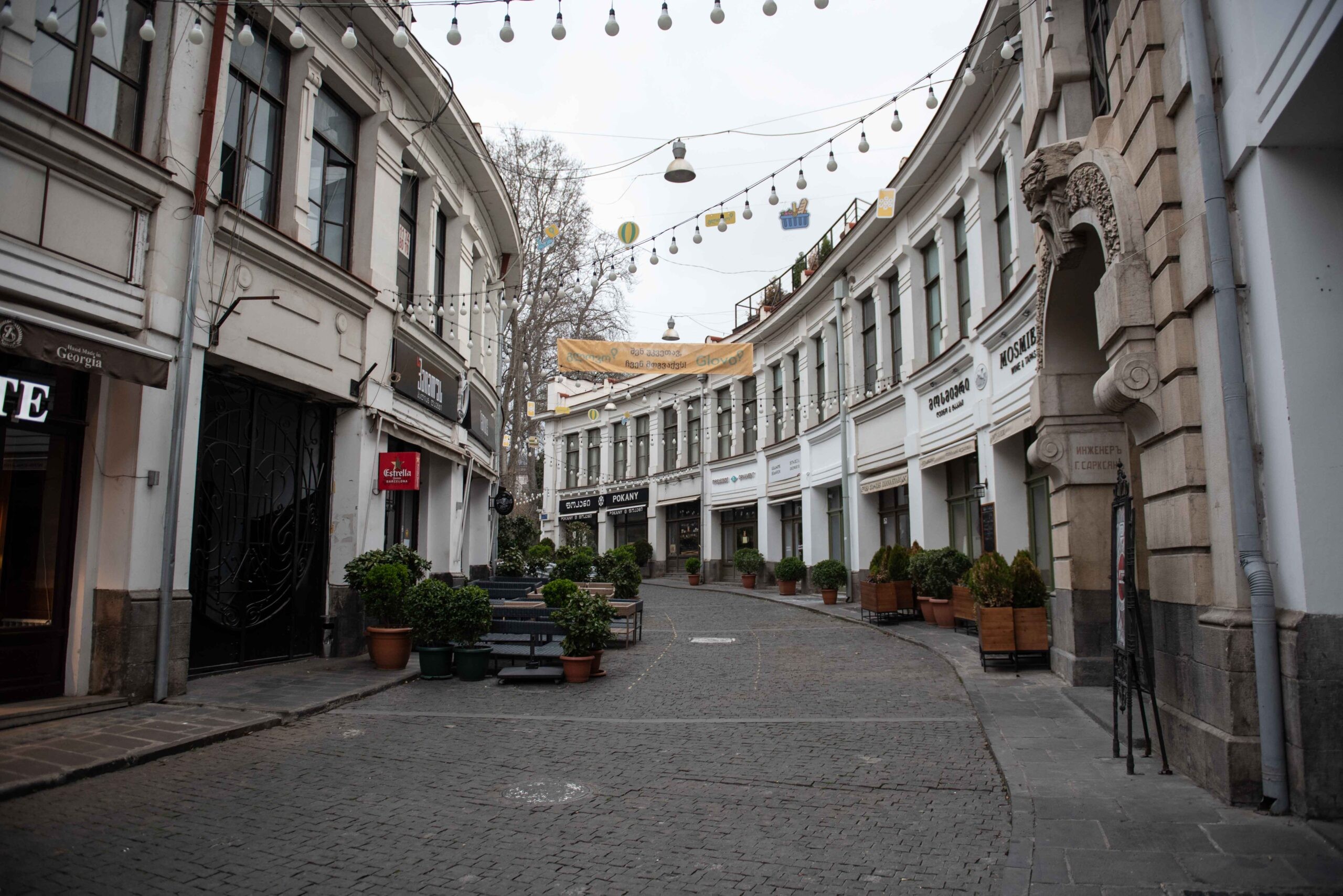 Shuttered buissnesses in Tbilisi's Bambis Rigi Street. Photo: Mariam Nikuradze/OC Media.