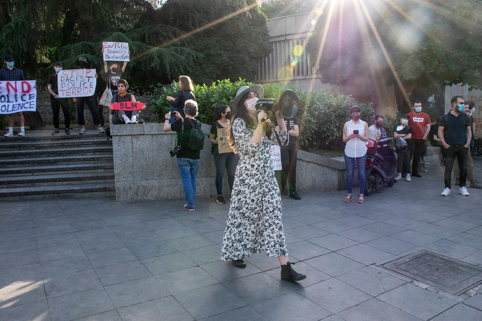 Protestors stand near the entrance to Rustaveli Metro Station. Photo: OC Media. 