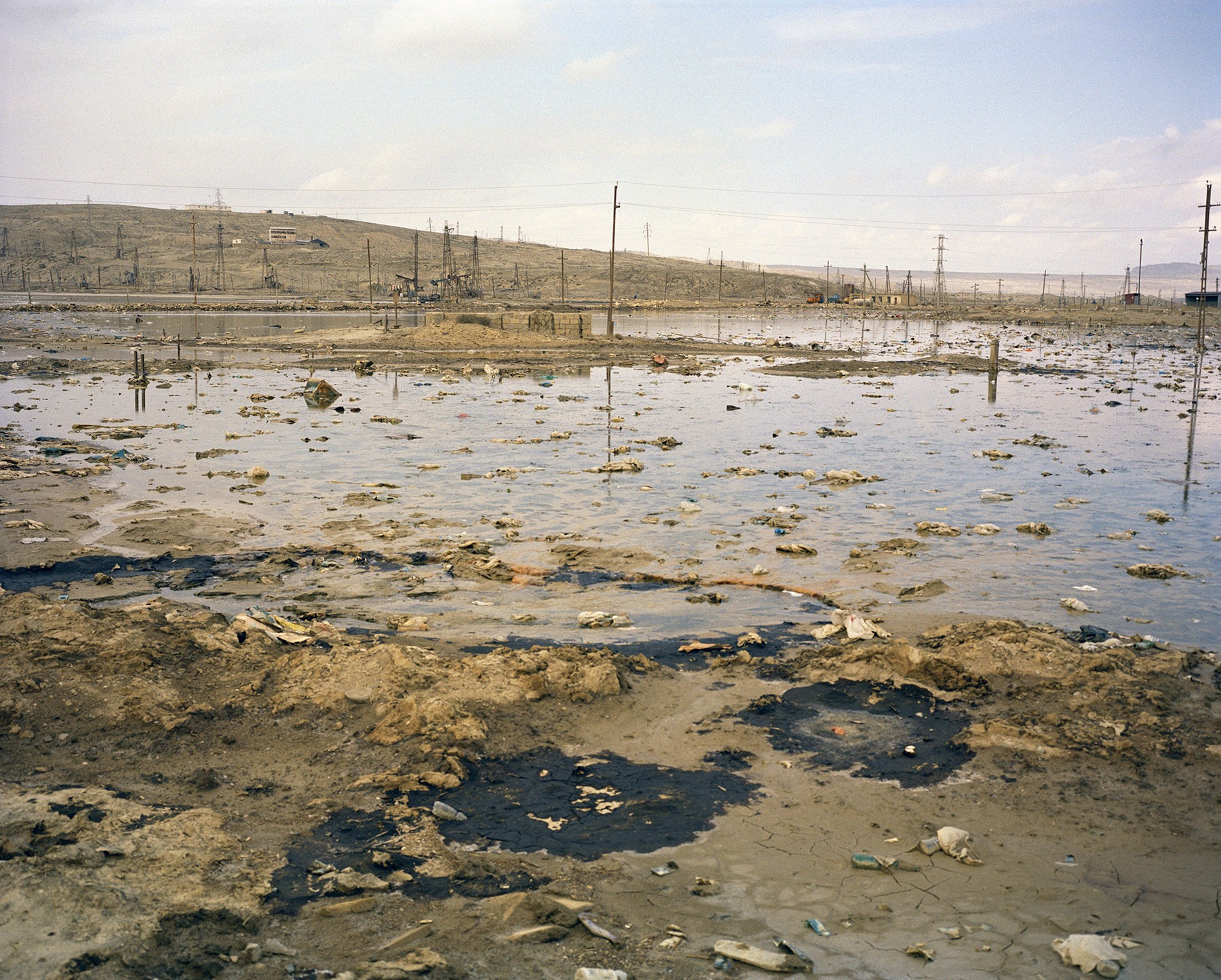 2014: Lokbatan Oil Field. From nowhere, a Soviet Volga screeched to a halt. A tall man unfolded himself from the car and demanded my documents. I was arrested, the reason, ‘this is a strategic object'.
