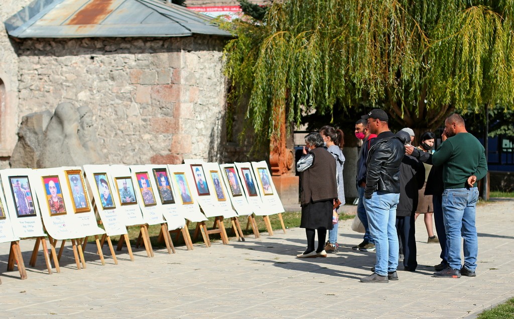 Portraits of soldiers killed in the war in Nagorno-Karabakh in a churchyard in Akhalkalaki. Photo: Amaliya Babayan/OC Media.
