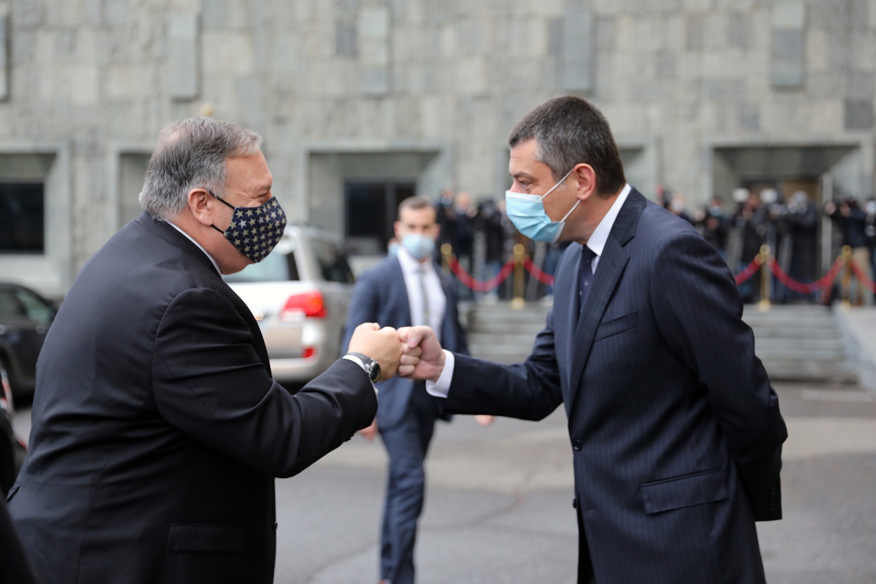 US Secretary of State Mike Pompeo fist bumps with Georgian Prime Minister Giorgi Gakharia. Photo via Giorgi Gakharia.