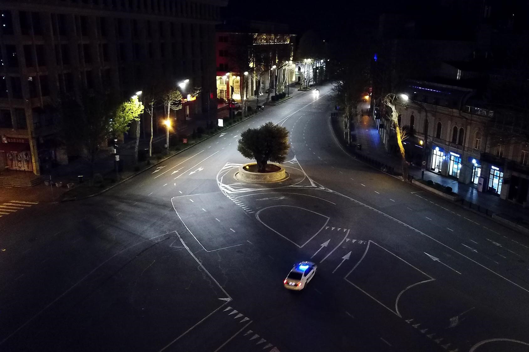 A police car during the curfew in Tbilisi. Photo: Mariam Nikuradze/OC Media.