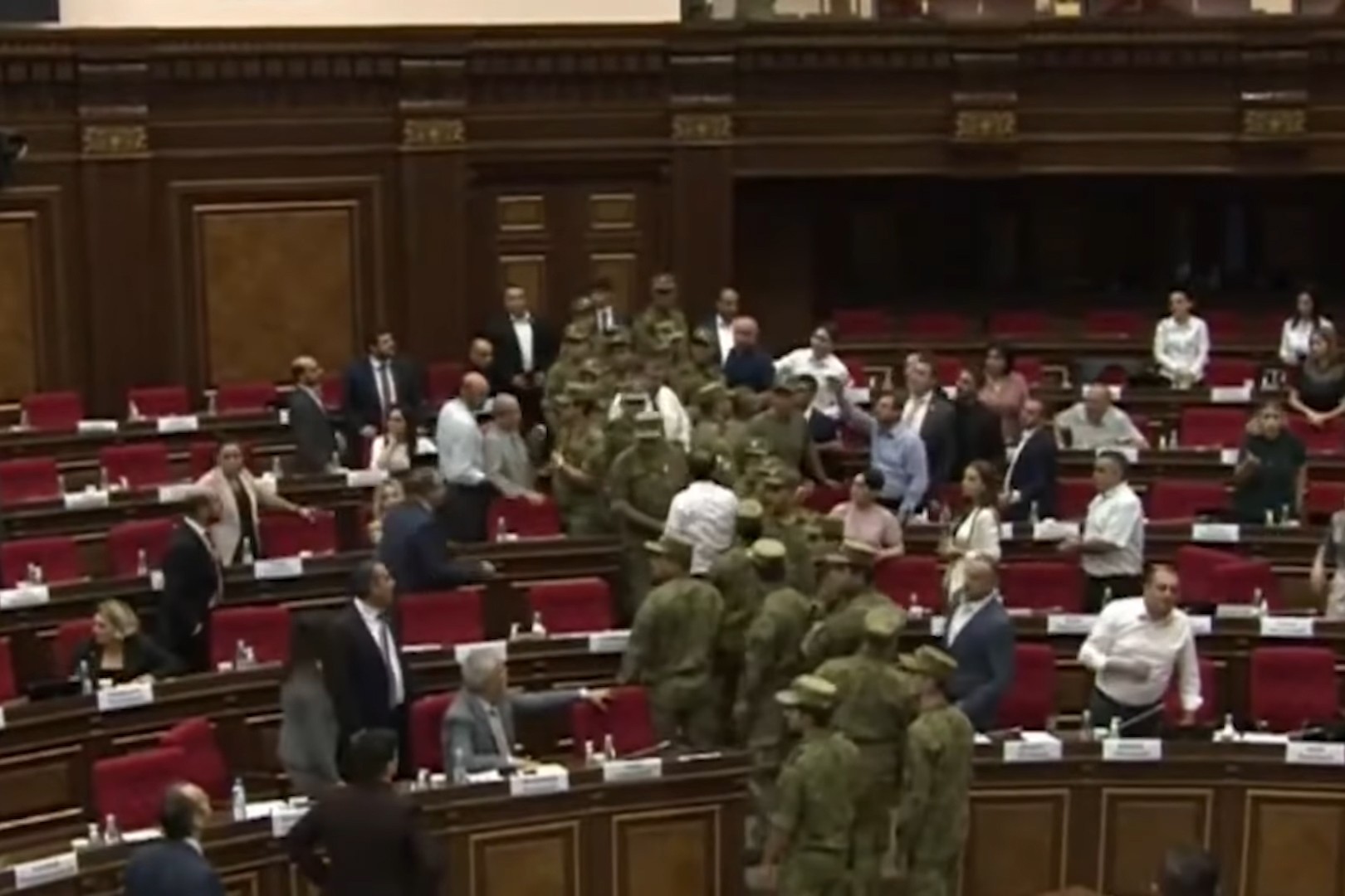 Security in the chamber of the Armenian parliament on 11 August.