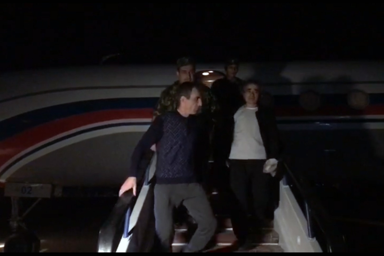 Armenian captives arrive in Yerevan on 8 September. Image via the Russian peacekeeping mission to Nagorno-Karabakh.