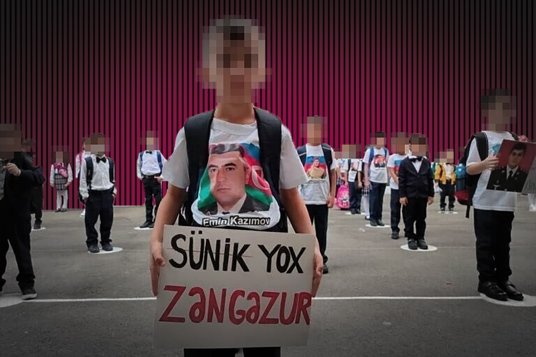 A child holds a poster reading: ‘Not Syunik,  Zangazur’. Illustration: Robin Fabbro/OC Media.