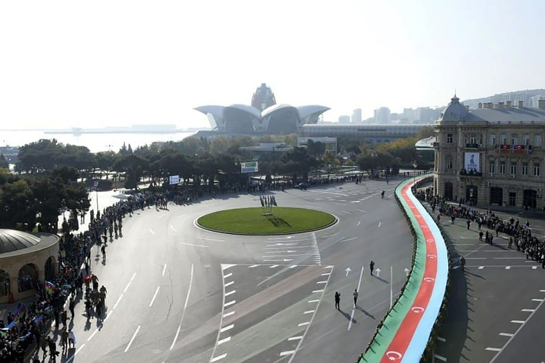 A massive Azerbaijani flag winds its way through Baku on 8 November. Photo: Azertag.