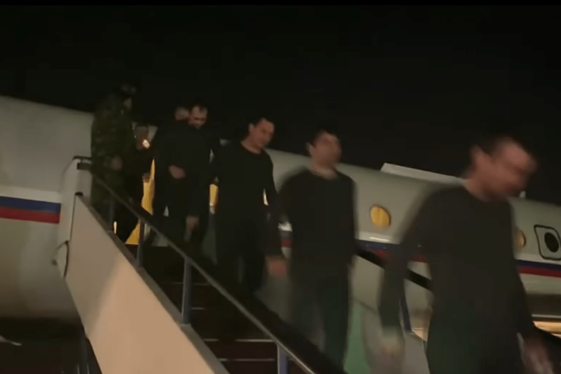 POWs land in Yerevan. Still via Sputnik. 
