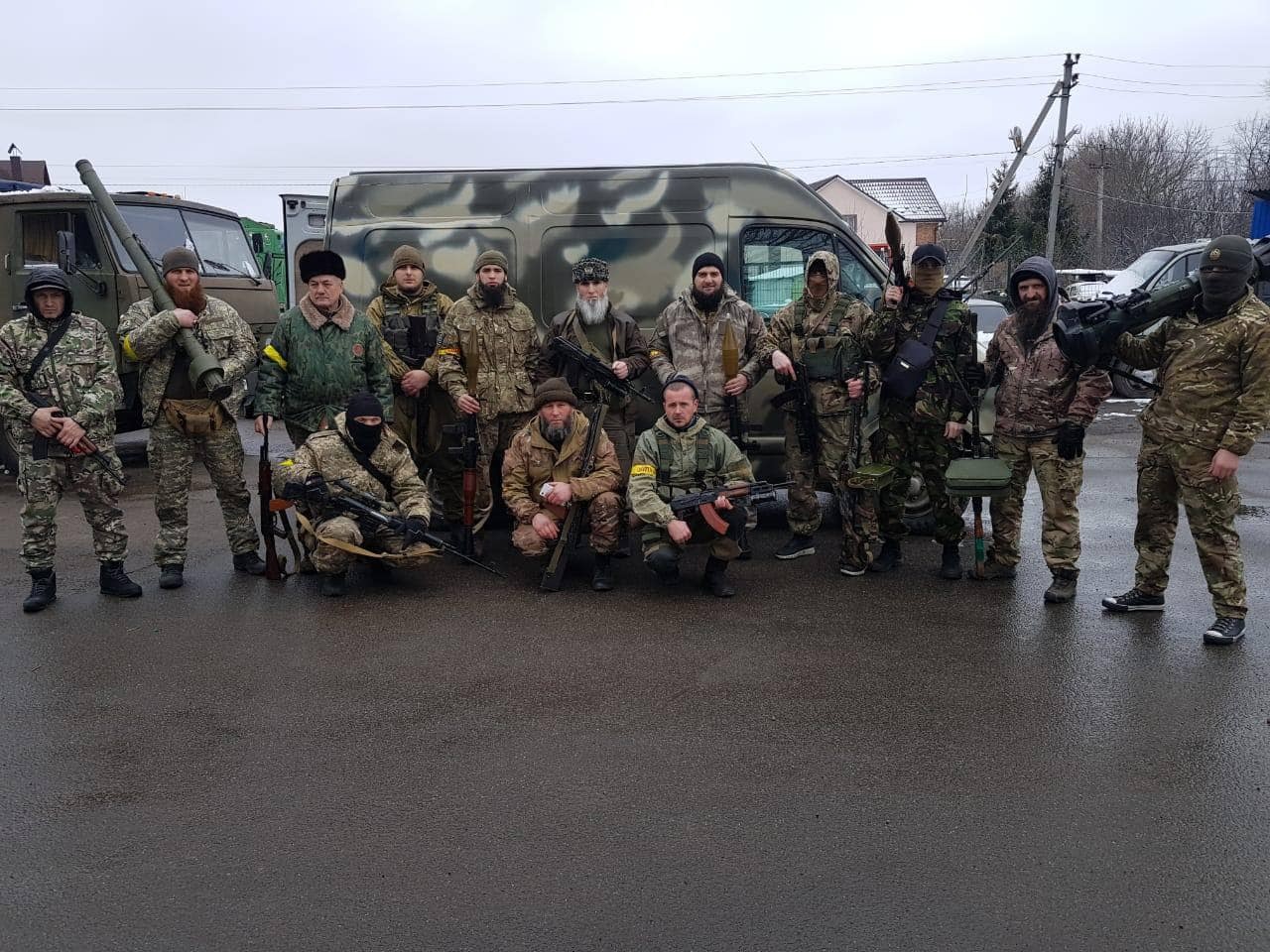 Members of the Sheikh Mansur Battalion wearing the yellow armbands of Ukrainian forces. The batallion’s commander, Muslim Cheberloevsky, is in the centre.